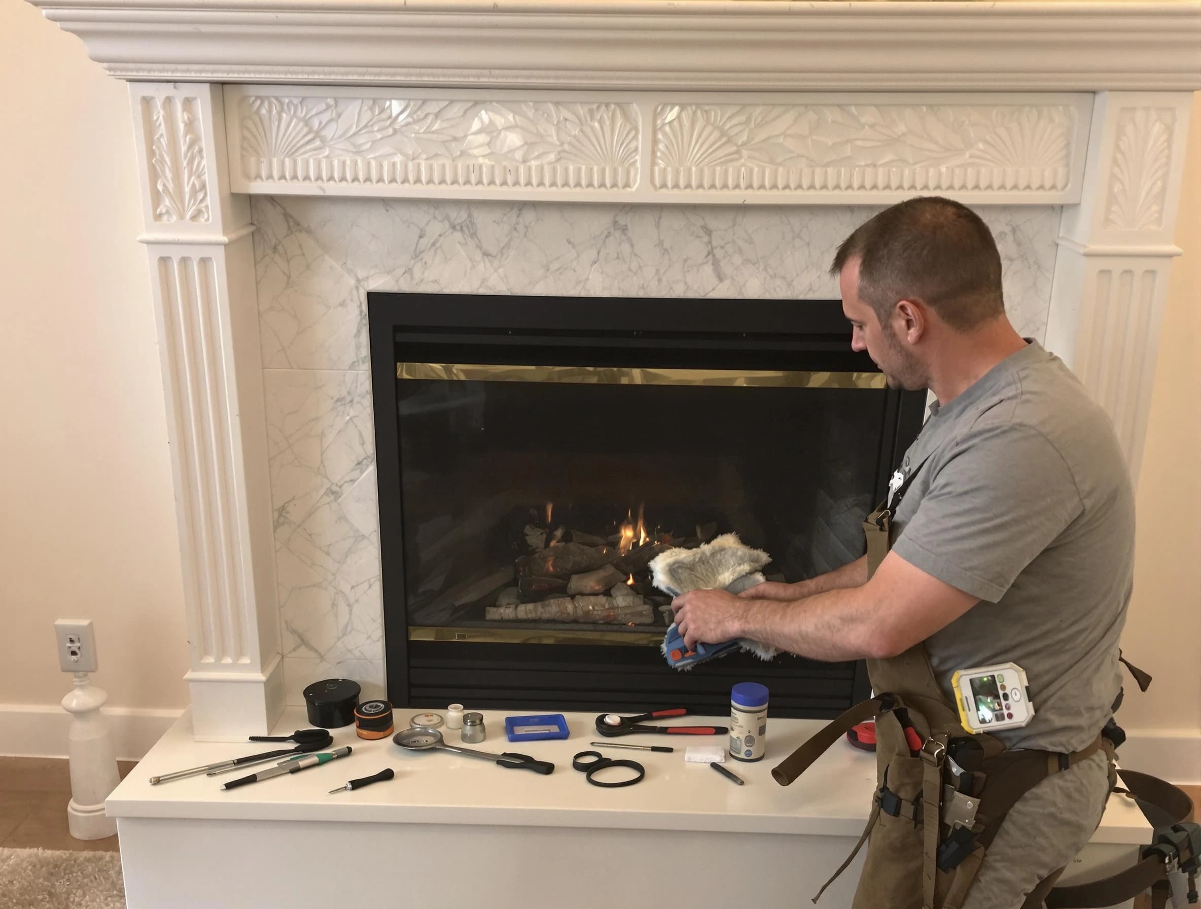 Williamsburg Chimney Sweep performing fireplace maintenance in Williamsburg, VA